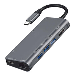 A gray USB-C Multifunction HUB with multiple ports, including USB ports and HDMI, visible on the side.