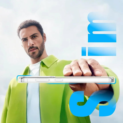 Man holding a smartphone with a clear case against a light blue background Samsung S26 Ultra