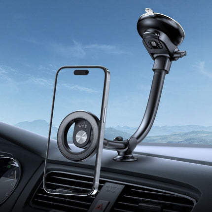 Phone holder on a car dashboard with a scenic background