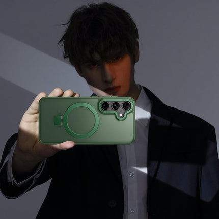 Person holding a green phone case with a dark background for Samsung S25 FE
