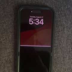 Phone with a mostly black display after an impact