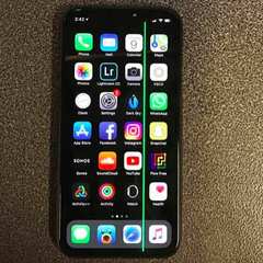 Phone screen with a green vertical line across it