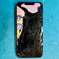 Phone with a shattered, smashed screen